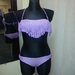 Violetinis maudymosi kostiumelis su kutais