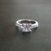 Žėrintis sidabruotas žiedas