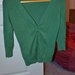 Žalias užsagstomas megztinukas