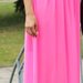 ryški rožinė suknelė