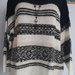 Vokiškas didelio dydžio megztinis