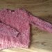 Rožinis pūkuotas megztinis