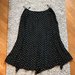 Juodas taškuotas sijonas