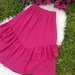 Ryškus ilgas rožinis sijonas