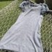 Megzta suknelė su natūralaus kailio rankovėmis