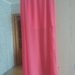 Ryškus rožinis ilgas sijonas su skeltuku