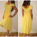 Nauja Svesiai geltona suknele