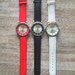 Geneva laikrodis raudona,juoda ar balta apyranke