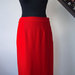 NAUJAS. Klasikinis raudonas sijonas