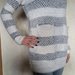 Baltos spalvos švelnus megztinis