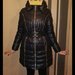 Juodas moteriškas paltas