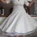 1950 stiliaus Ivory atspalvio balta swing suknelė