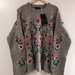 Zara gėlėtas megztinis