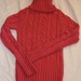 Rožinis megztas megztinis