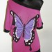 Stilinga rožinės spalvos tunika su drugeliu