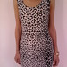 Aptempta leopardo rašto suknelė