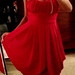 prisirpusiai raudonos spalvos nuostabi suknele
