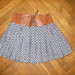 Naujas pilkas,taskuotas sijonas