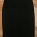Juodas klasikinis sijonas