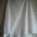 Baltas sijonas siuvinėtas gėlytėmis