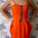 Ryški tamsiai oranžinė suknelė