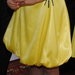 Geltona proginė suknelė