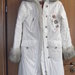 Baltas moteriškas žieminis paltas