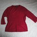 Švelnus raudonas megztinis