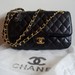 Chanel 2.55 juoda rankine