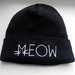 Šilta kepurė, su užrašu ''MEOW''