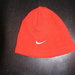 Raudona Nike kepurytė