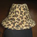 Leopardinė skrybėlė