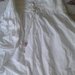 Baltas aukštu liemeniu sijonas