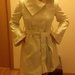 Baltas moteriskas paltas