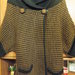 Rudai juodas megztinis