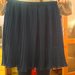 Mėlynas kluostuotas sijonas