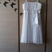 Balta, vieną kartą dėvėta suknelė