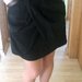 Juodas tulpės formos sijonas