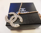 Chanel gold pakabukas su grandinėle