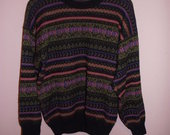 Raštuotas didelis megztinis