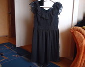 Taškuota juoda suknelė