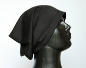 Nauja juoda trikotažinė beanie stiliaus kepurė