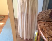 ilgas plonas kreminis sijonas