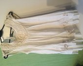 Balta suknelė su neriniais 