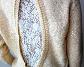Žvilgantis megztinis