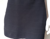 Juodas trikotažinis sijonas