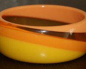 Geltonas/oranžinė apyrankė