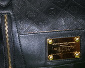 Solidus Louis Vuitton rankinukas