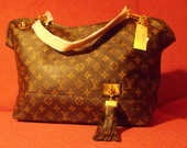Louis Vuitton rankinukas