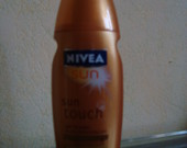 Nenaudotas įdegio losjonas SUN TOUCH iš NIVEA